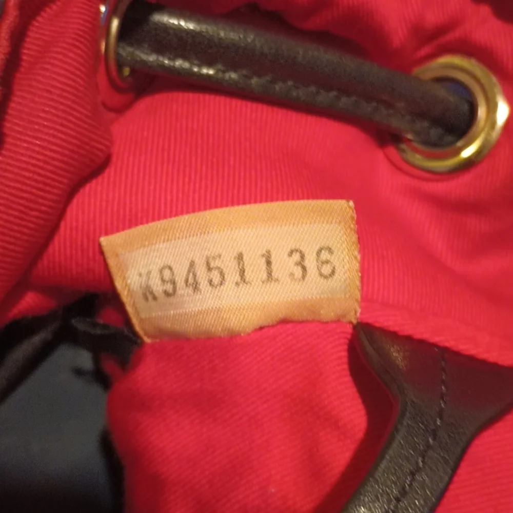 Dooney & Bourke Plaid Drawstring BackPack - Picture 5 of 5